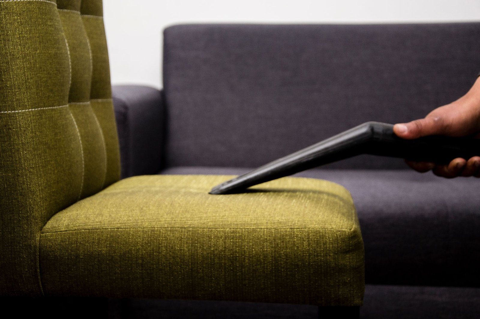 Professional cleaning of a fabric sofa at home in Amsterdam